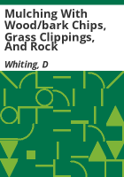 Mulching_with_wood_bark_chips__grass_clippings__and_rock